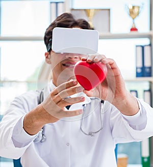 Doctor working with virtual VR reality glasses