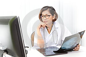 doctor working by watching to computer monitor