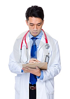 Doctor write on report