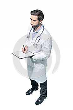 Doctor writing medical records on a clipboard