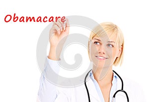 Doctor writing Obamacare