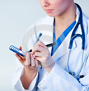 Doctor writing a perscription