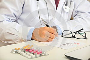 Doctor writing a perscription