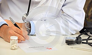 Doctor writing a perscription