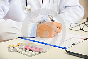 Doctor writing a perscription