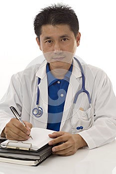 Doctor writing a prescription