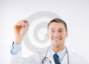 Doctor writing something in the air
