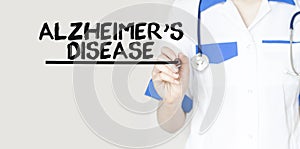 Doctor writing word Alzheimers Disease with marker, Medical concept