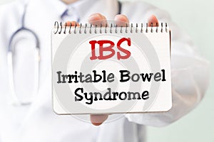 Doctor writing word IBS Irritable Bowel Syndrome with marker, Medical concept