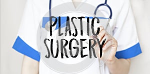 Doctor writing word Plastic Surgery with marker, Medical concept