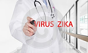 Doctor writing the words VIRUS ZIKA with black marker on visual