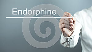 Doctor writng Endorphine text in screen