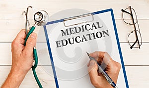 The doctor wrote - The doctor wrote - Medical Education, stethoscope, glasses, pen