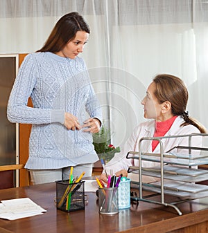 Doctor with young female patient