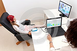 Doctor and young patient during a biofeedback therapy