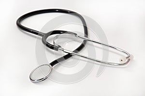 Doctoral stethoscope on a white surface