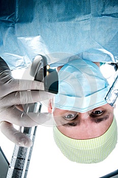 Doctors Anesthesiologist preparing intubated patient before surgery.
