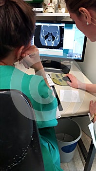 Doctors checking MRI on on the screen