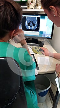 Doctors checking MRI on on the screen