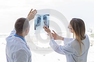 Doctors discuss x-ray