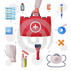 Doctors Hand Holding First Aid Kit Box with Medical Equipment and Medications, Gloves, Flashlight, Elastic Bandage