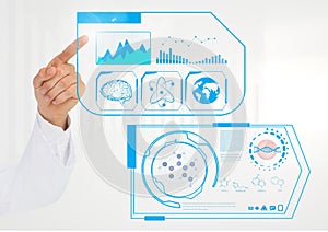 Doctors hand touching digitally generated medical interface