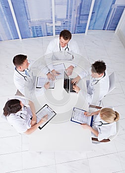 Doctors having conference meeting in hospital