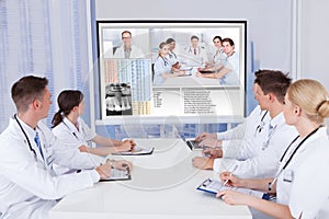 Doctors having video conference meeting in hospital
