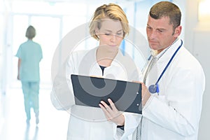 Doctors looking at record