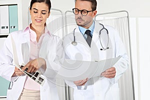 Doctors with medical records, concept of consult
