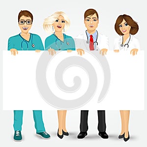 Doctors and nurses holding a blank billboard