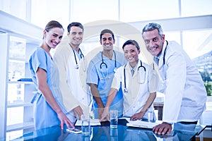 Doctors and nurses smiling at camera