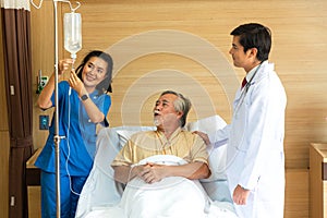 Doctors and nurses are taking care of patients in special hospital rooms