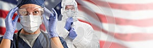 Doctors or Nurses in Medical Personal Protective Equipment PPE Against The American Flag Banner