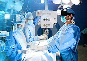 Doctors operating wearing VR Virtual Reality Headset with Interface