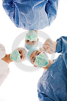 Doctors pointing at something