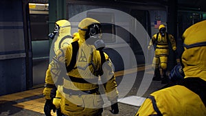 Doctors in protective chemical clothing are waiting for the train to go to fight the pandemic. The concept of a post