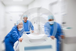 Doctors rushing patient to surgery