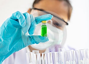 Doctors or scientists prepare a vaccine to prevent a new strain of influenza to inject the patient to create immunity in the body