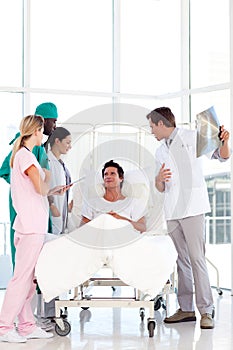 Doctors speaking to a patient