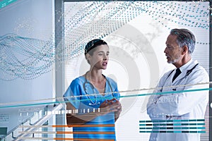 Doctors standing with DNA interface