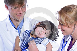 Doctors taking care of toddler