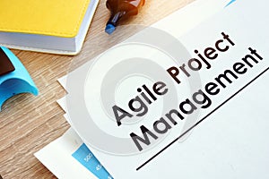 Document Agile Project Management on a table.