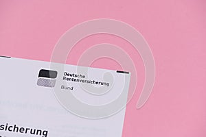Document from Deutsche Rentenversicherung on a pink background