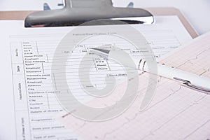 Document file with patient registration form and cardiogram