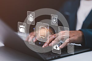 Document Management System concept. Online document file data software for efficient archiving. Businessman using a computer to