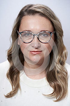 Document photo of fat attractive adult woman with glasses.