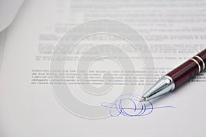 Document signed with a pen, contract