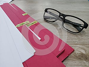 document to sign in overtime work with glases