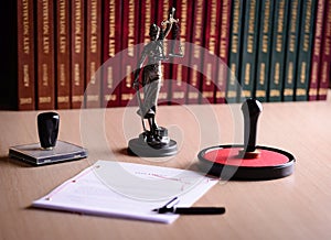 Document waiting for a notary public sign on desk